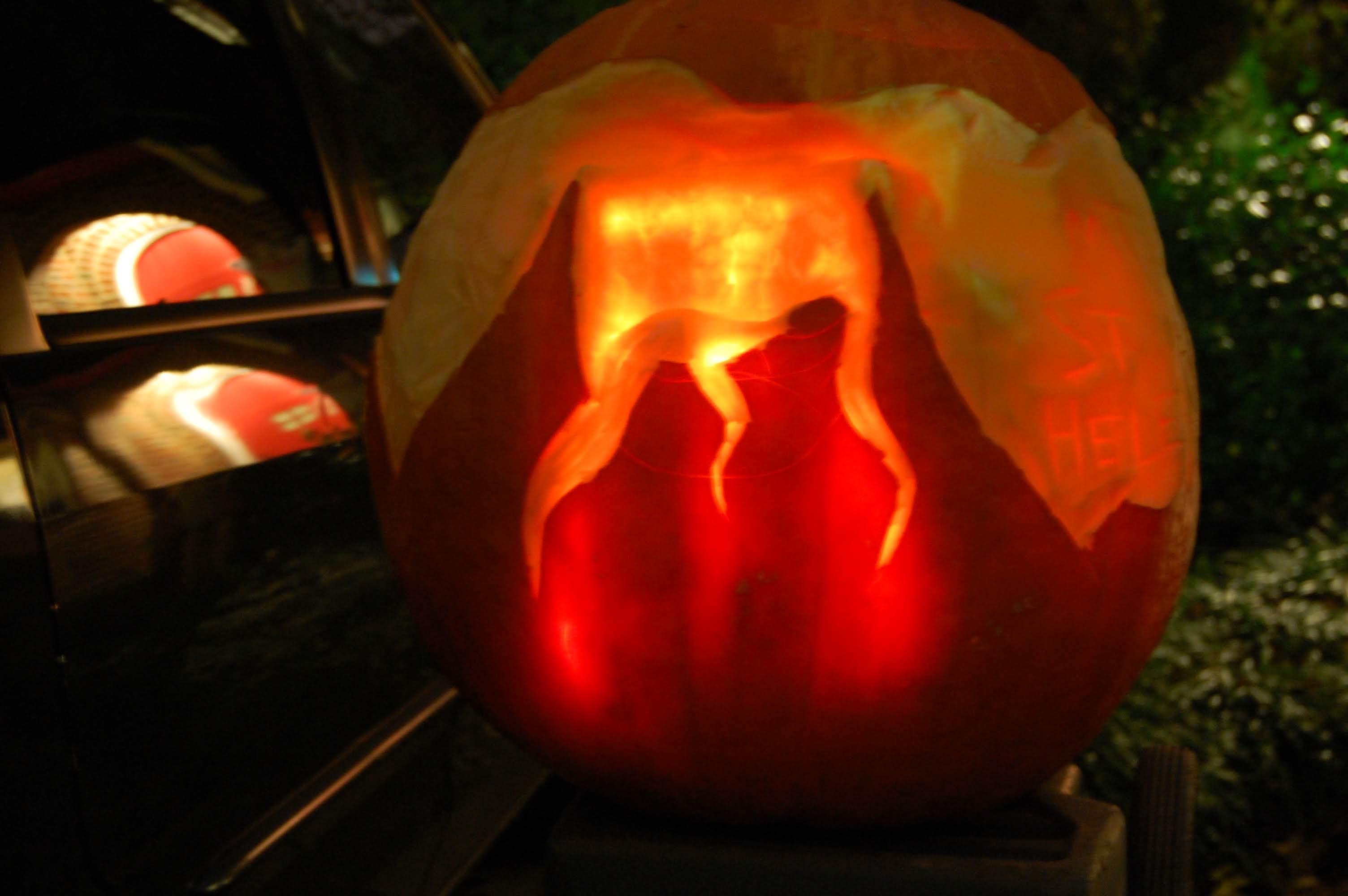 Pumpkin carved 2012 as a volcano, the calm mountain surface visible from the outside and the magma hidden inside until the candle is lit.